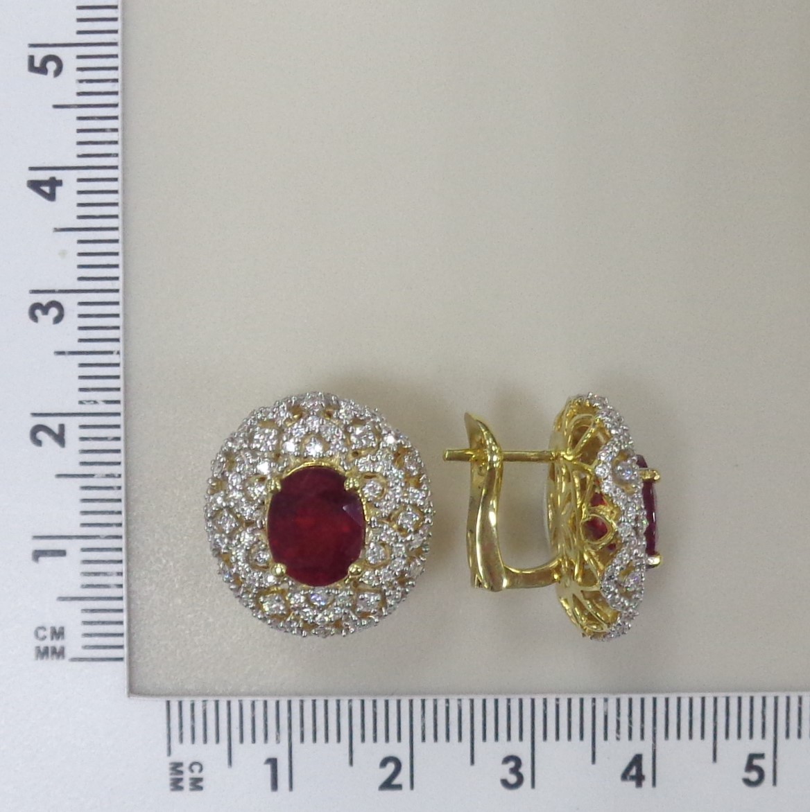 Серьги из желтого золота с рубинами